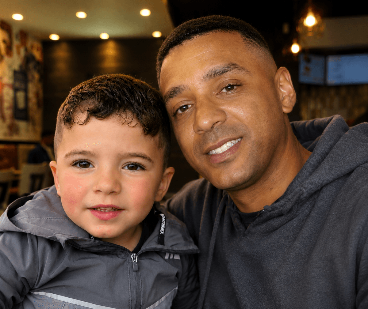 NeuroKids Space founder Duane Walters with his son in a source-supplied photograph